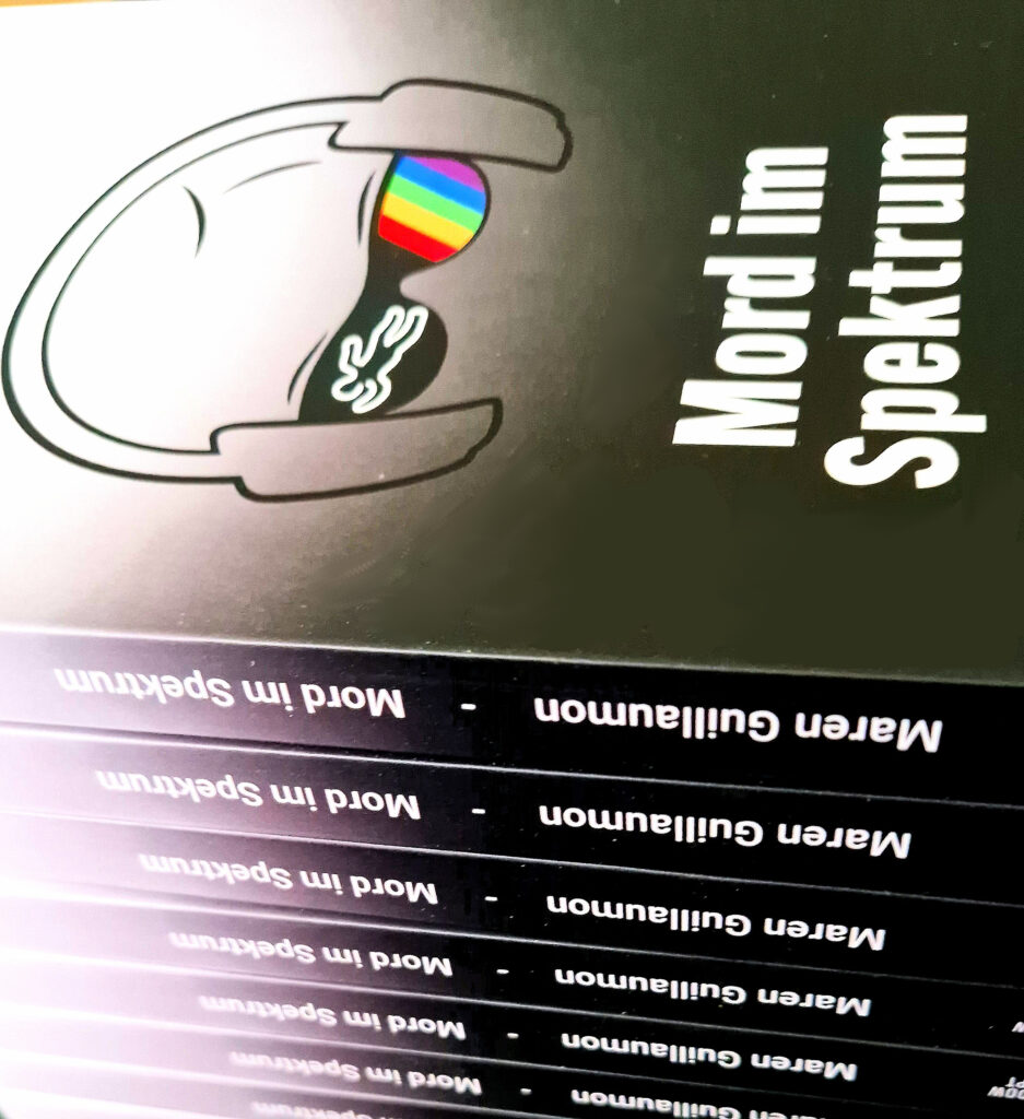 Ein Stapel von Büchern des Autismus-Krimis "Mord im Spektrum"